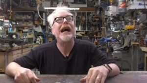 Mythbusters, Adam Making a wild face for PlayStation removing Discovery content article