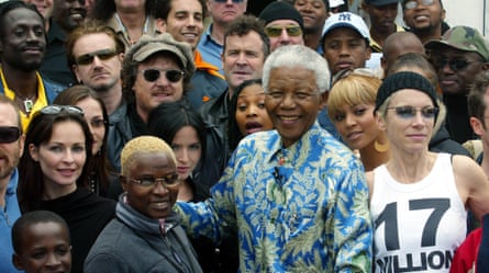 Nelson Mandela with (from left) Angelique Kidjo, Beyoncé, Annie Lennox and others who performed at the 46664 Aids benefit concert in 2003.