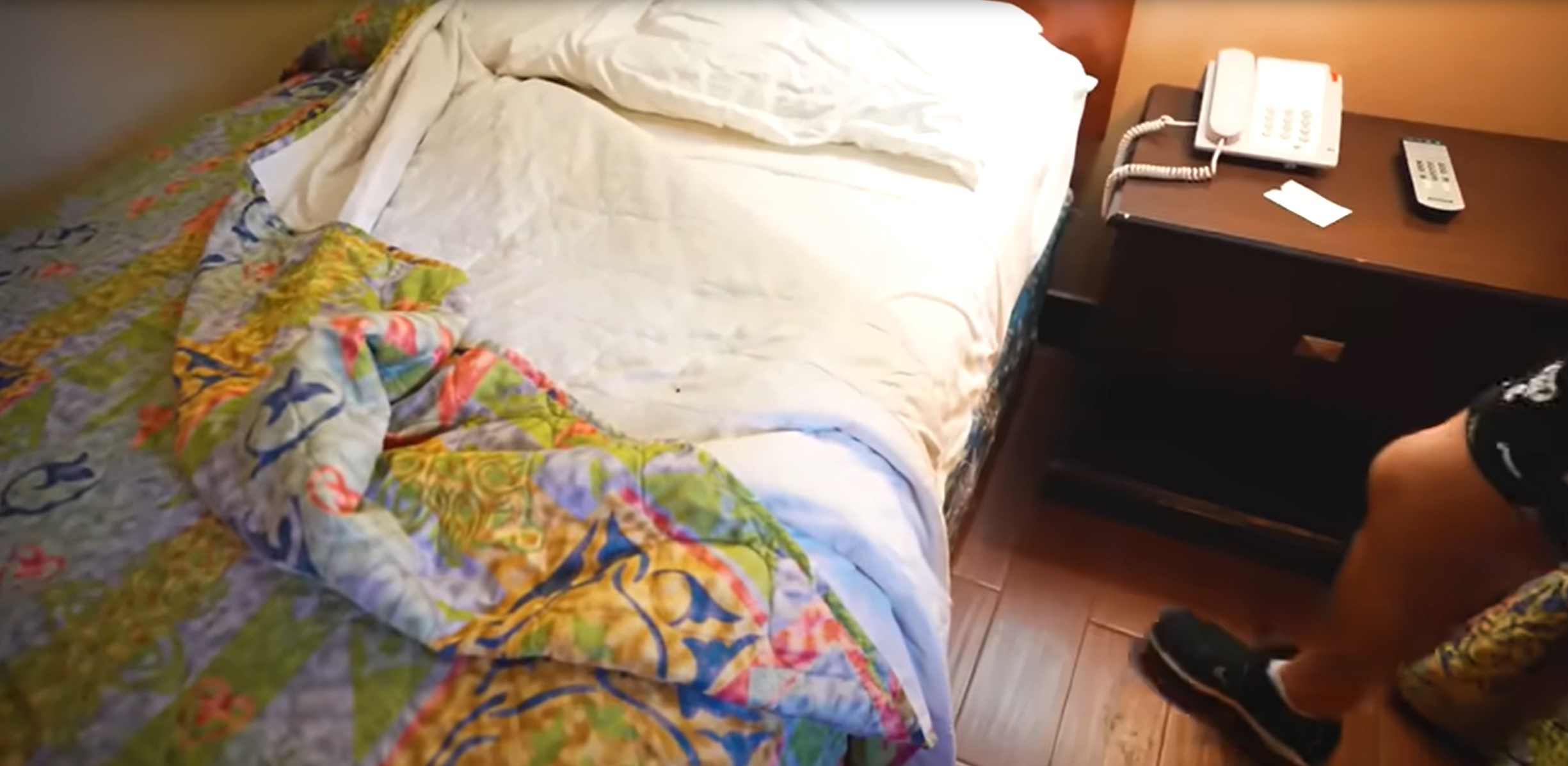 The youtuber claimed to have found a hair and stains on his bed sheets.