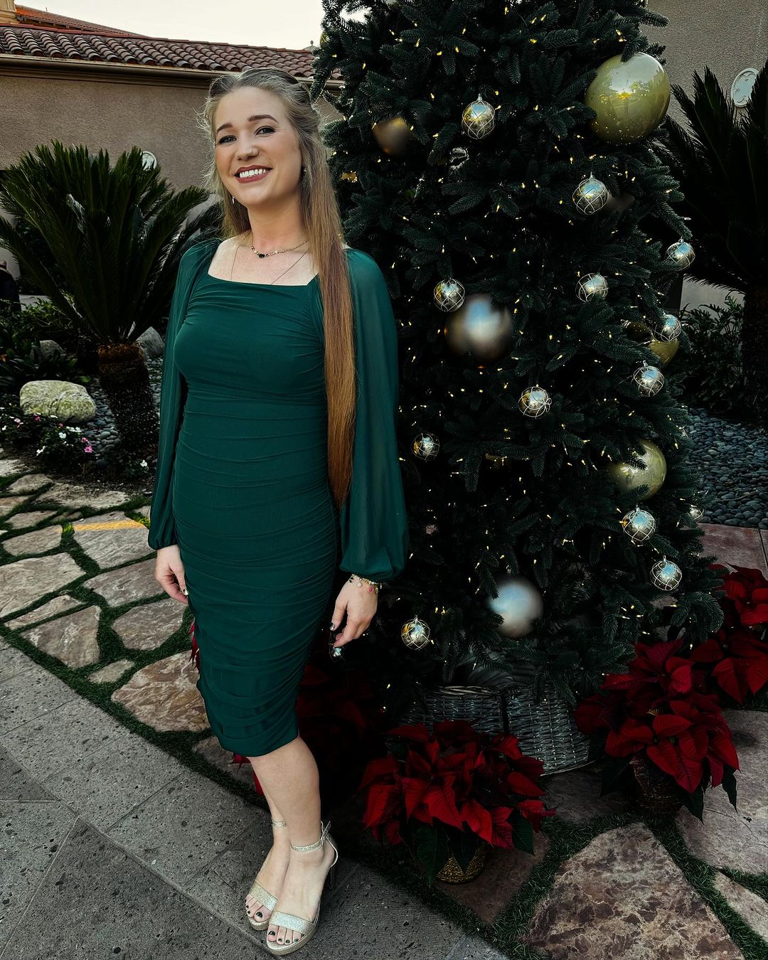 The daughter of Christine and Kody Brown showed off her weight loss in a skintight emerald green dress
