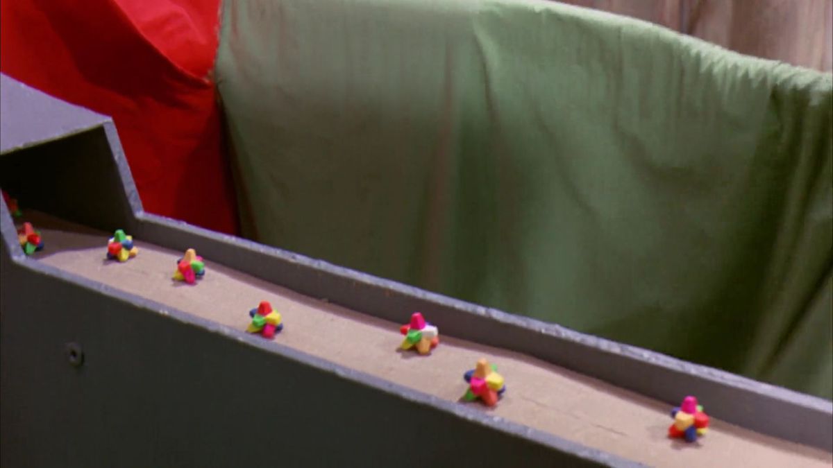 The Everlasting Gobstoppers rolling out on a conveyor belt