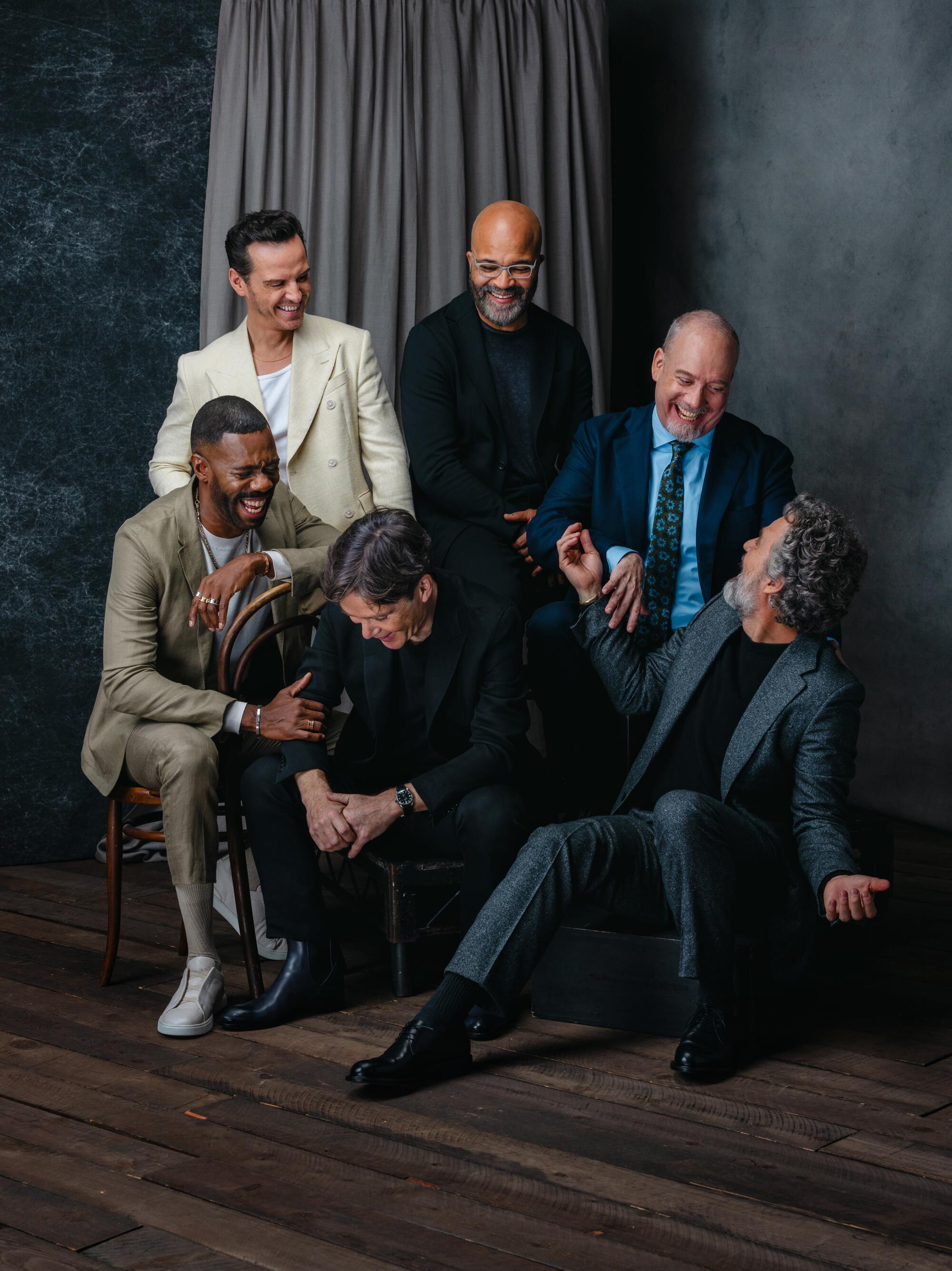 6 acclaimed actors having a laugh in front of a dark background before sitting down for the 2023 Envelope Actors Roundtable.