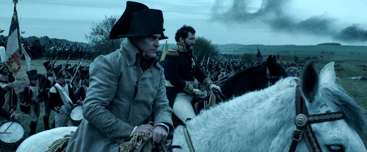 Joaquin Phoenix on horseback leads his troops in "Napoleon." 