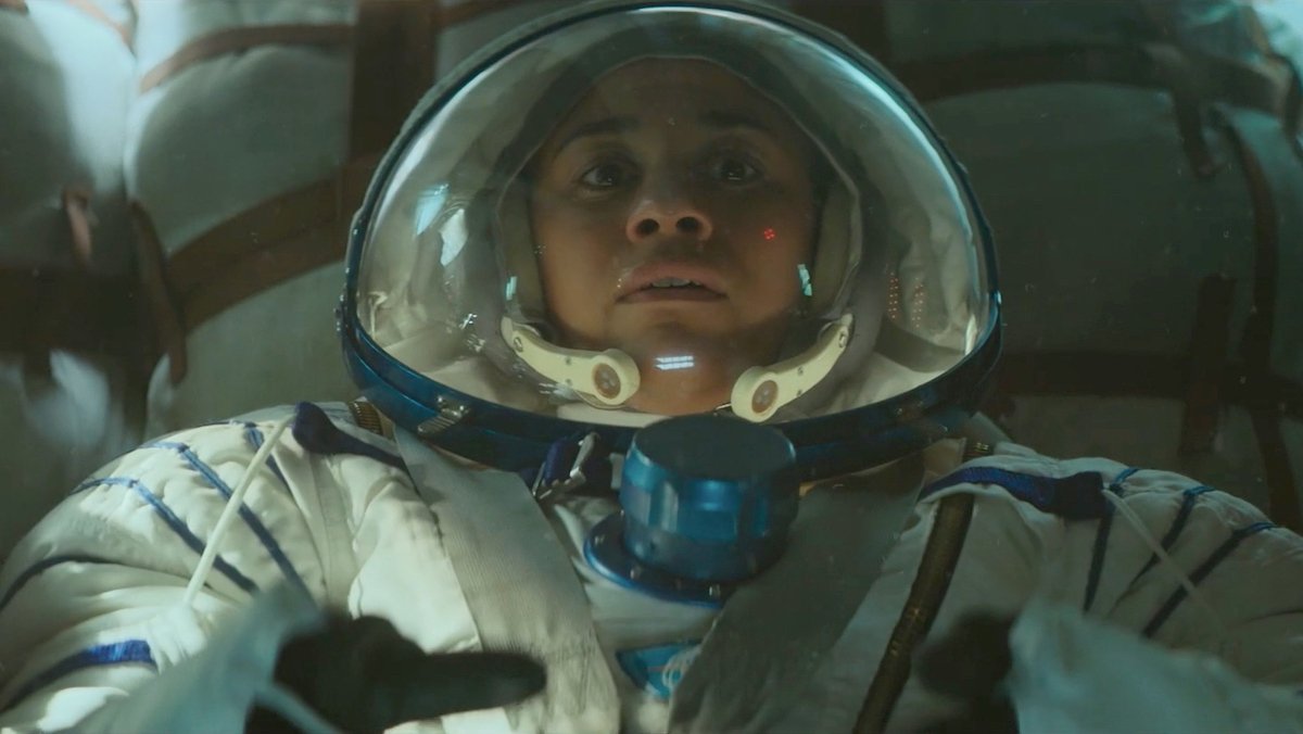 Ariana DeBose in an astronaut suit in the I.S.S. trailer