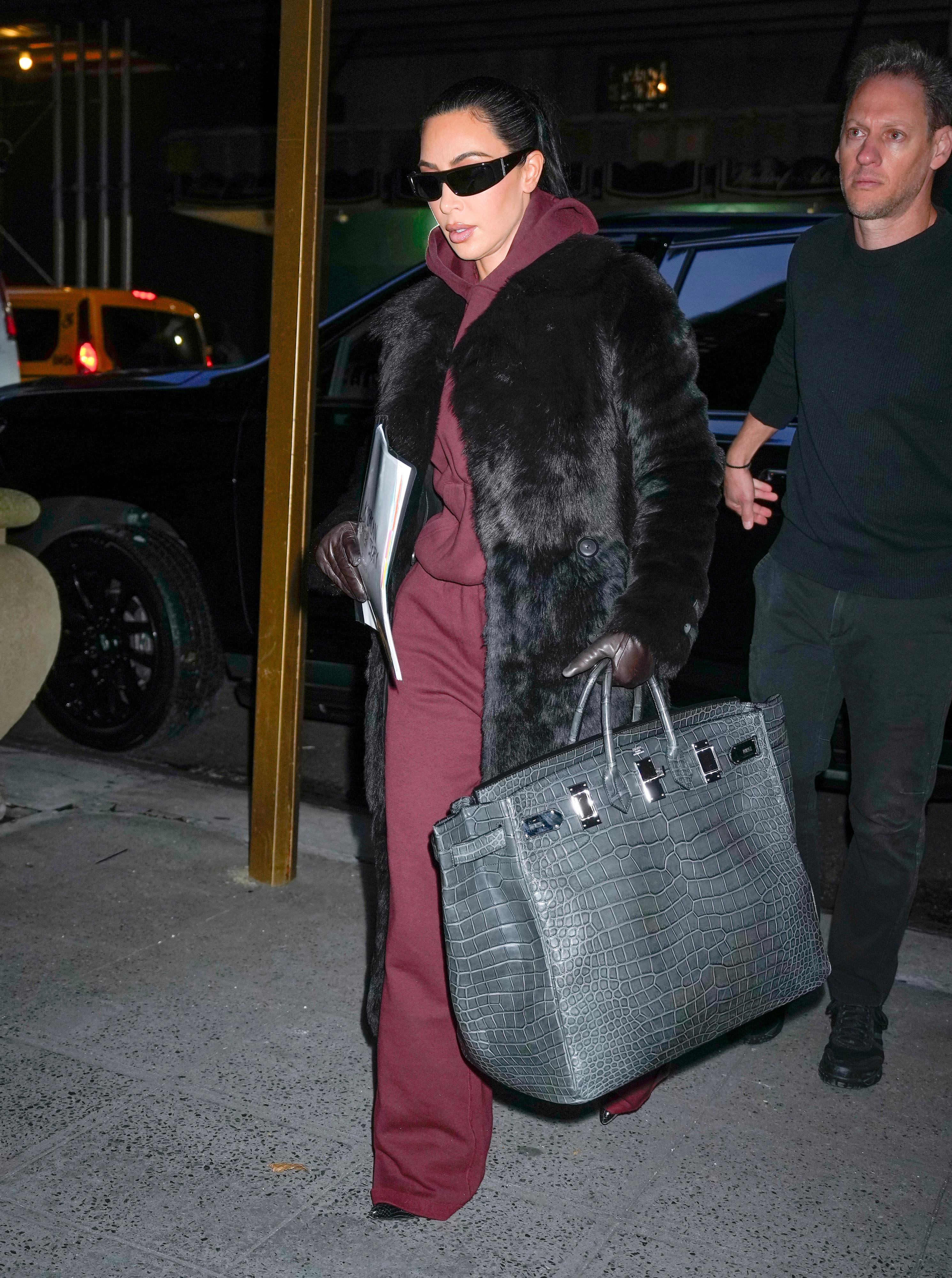 Kim was first to wear the sweatsuit, fur coat, and super-expensive Hermés Birkin bag