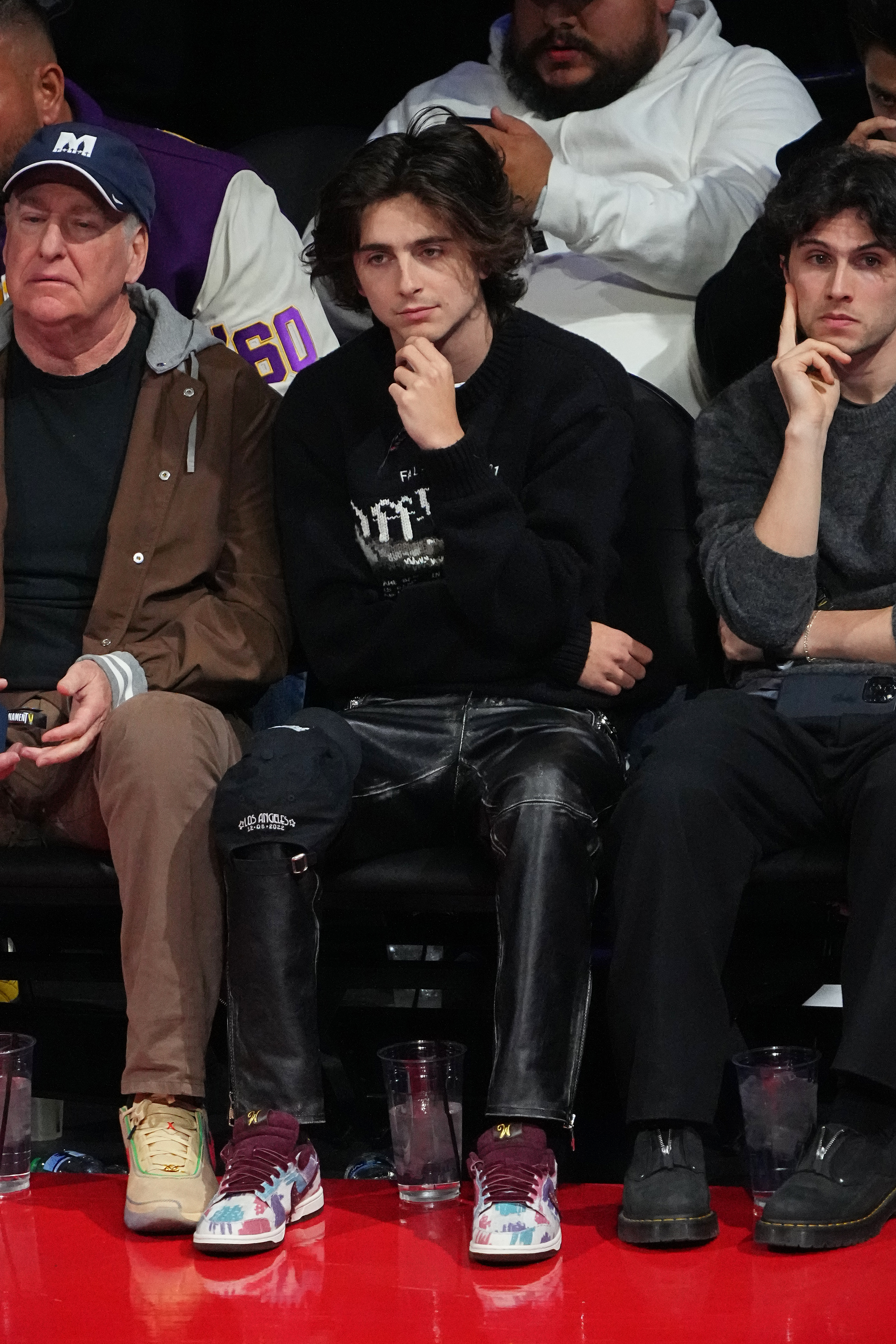 Fans noticed that Kylie had changed her phone background, replacing Timothée with a photo of her two kids
