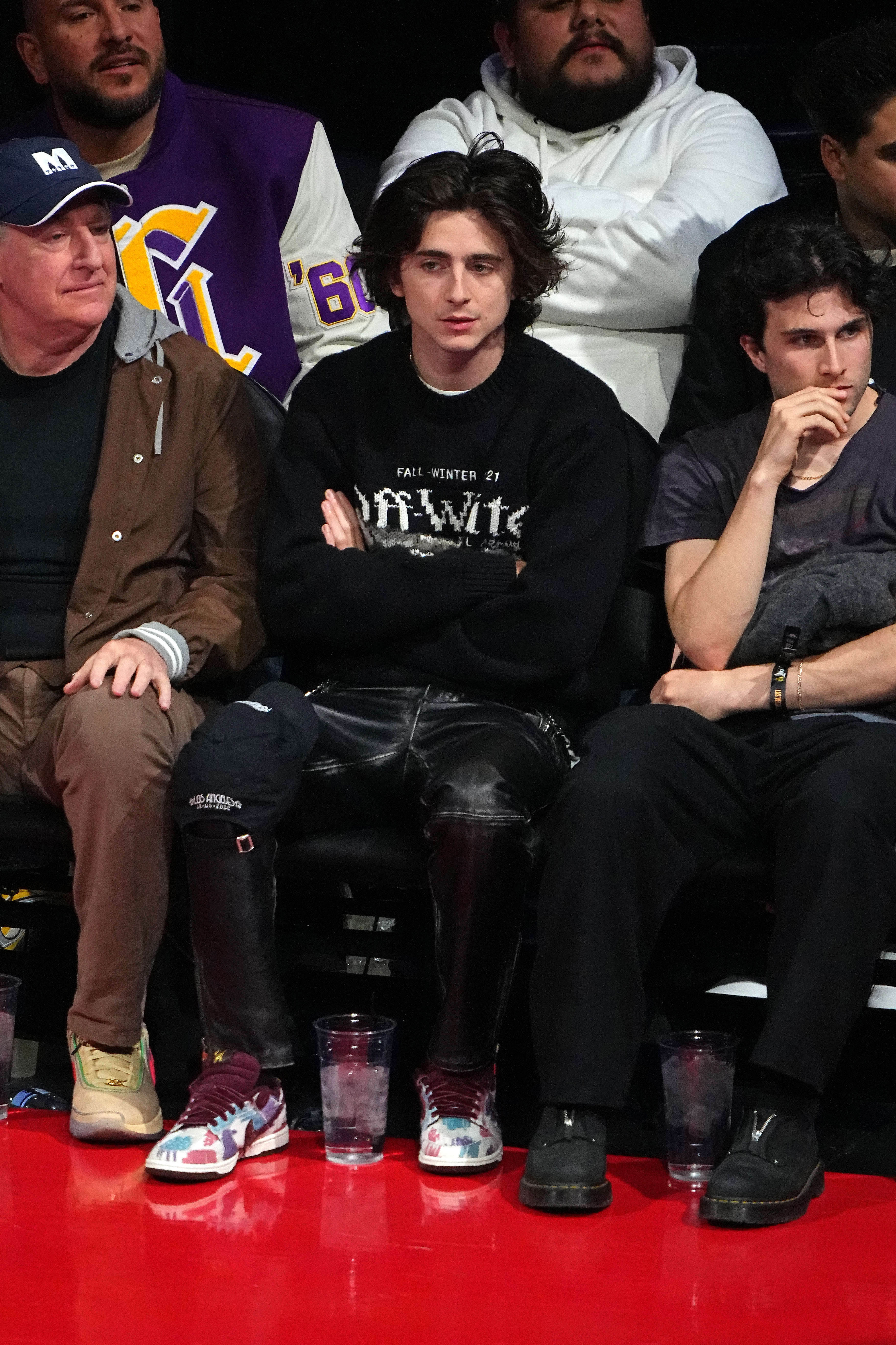 Timothée looked solemn throughout many moments of the basketball game