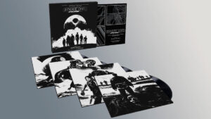 Mondo's 4-disc Rogue One Soundtrack set on display with original artwork covers for the albums laying down