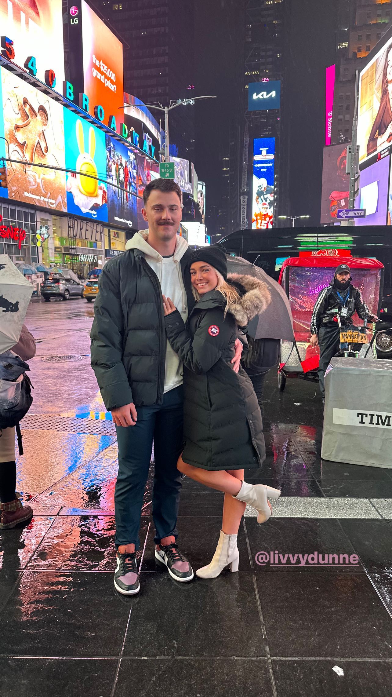 The two then posed for a photo by Times Square