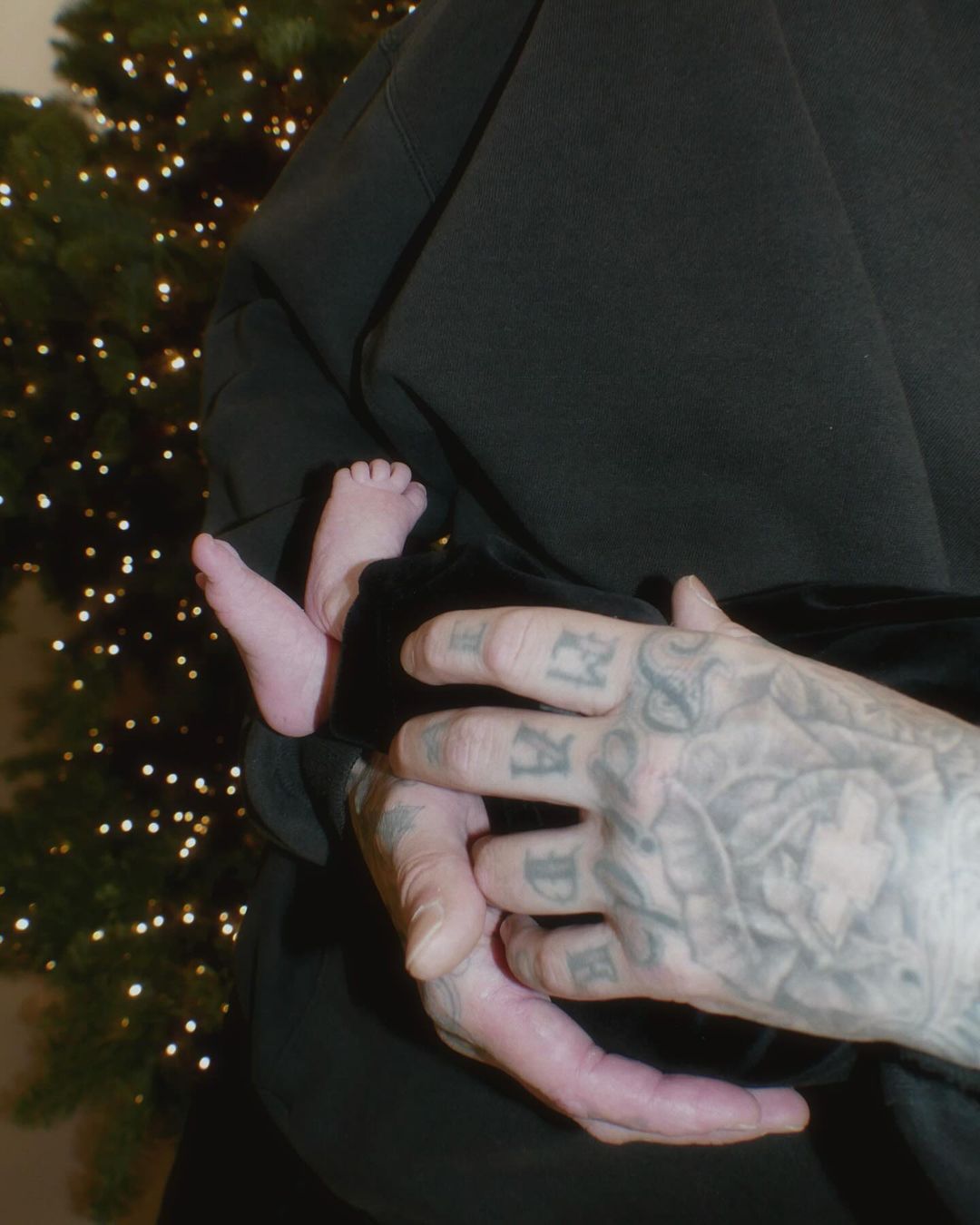 In another picture, Travis flaunted his son's adorable and tiny feet