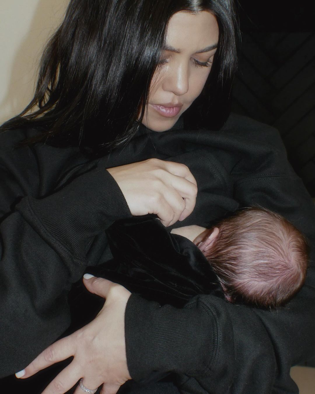 Kourt also shared an intimate snap breastfeeding her new baby
