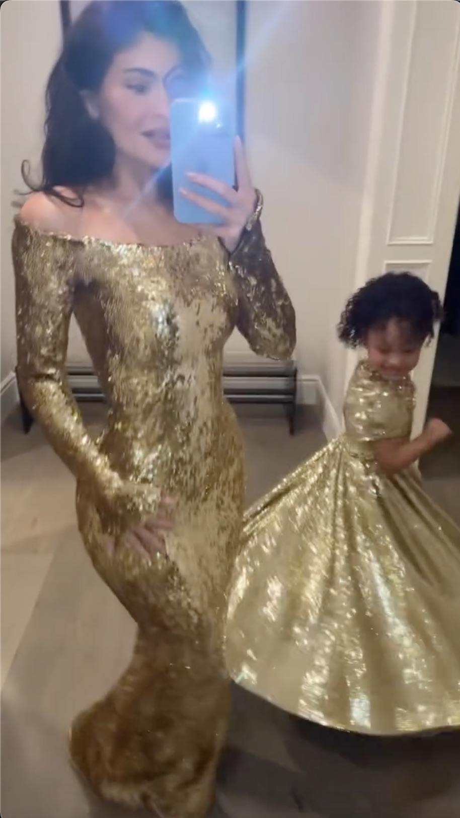 She matched with her daughter Stormi, 6, who wore a custom Dolce and Gabbana gold dress