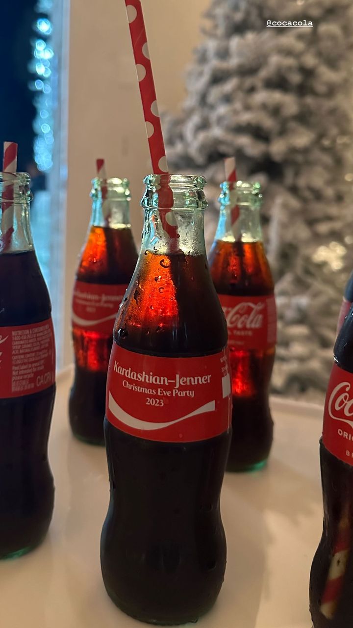 The family included personalised Coca-Cola bottles at their event