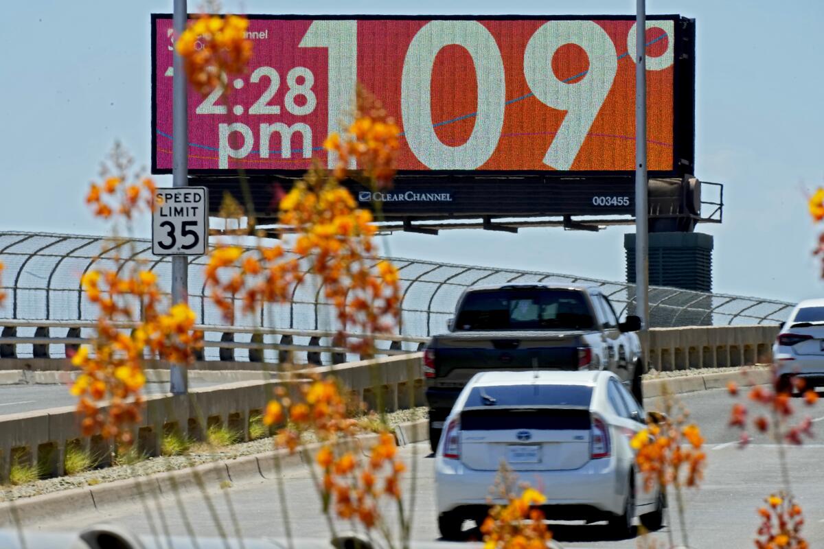 A digital billboard displays a time and temperature