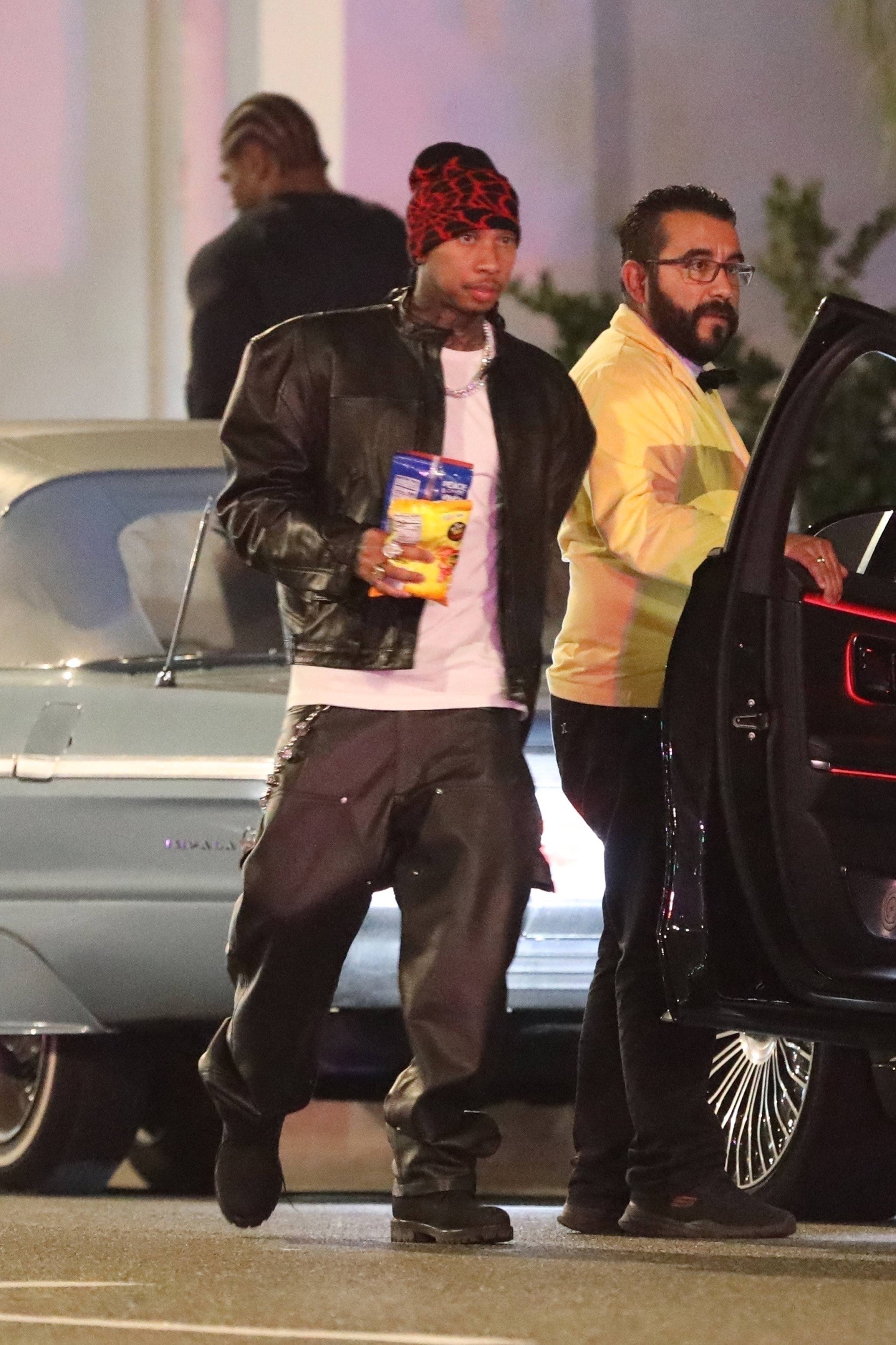 Chloe got into the passenger seat of Tyga's car as they left the club