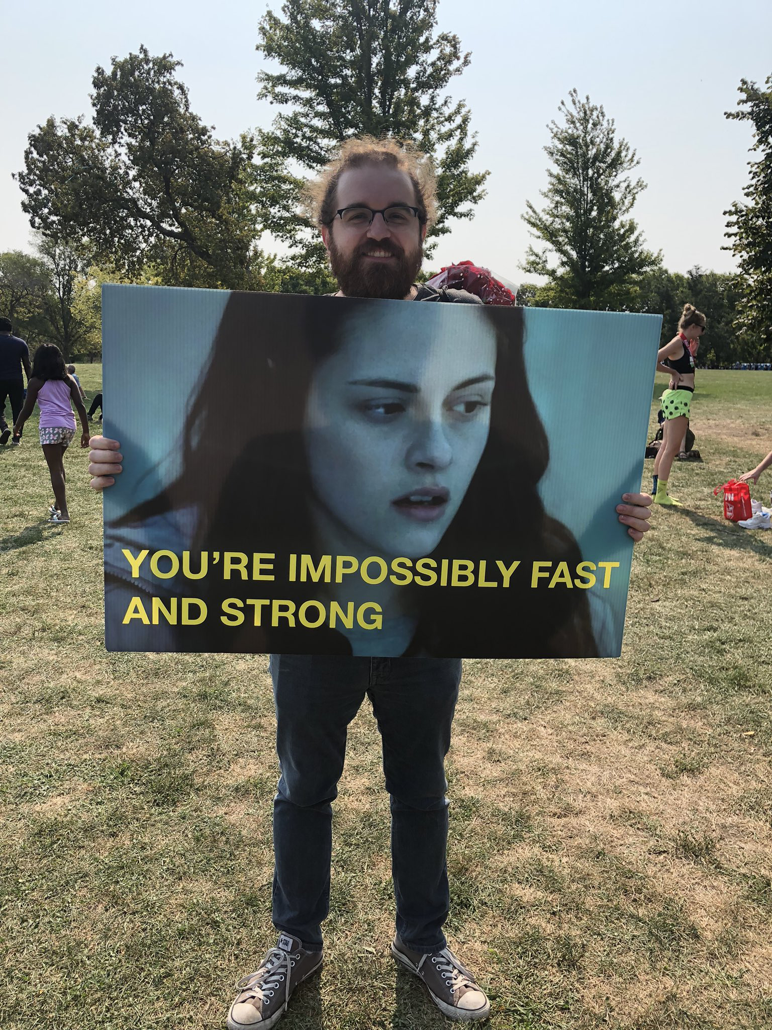 Ben once went viral for holding a Twilight sign at his wife's race
