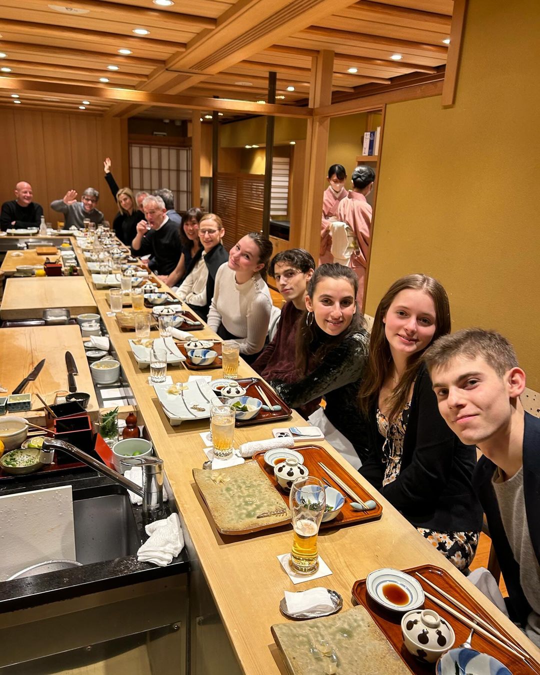 The group enjoyed the exhibits at the TeamLabs museum and ate sushi at a restaurant