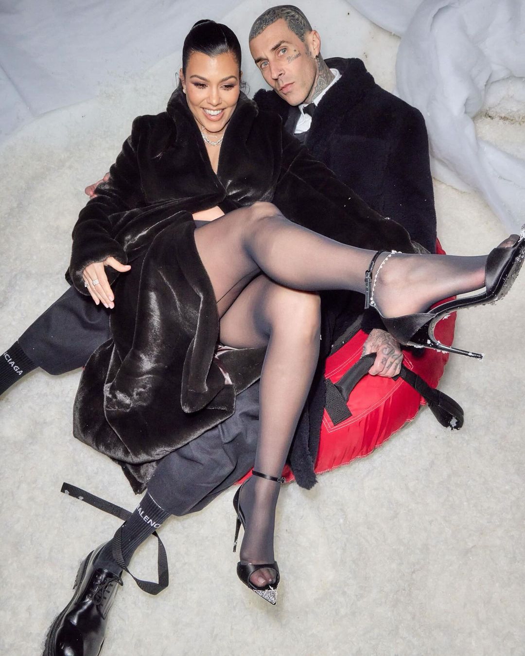 Kourtney recently uploaded snaps of her and Travis while they were enjoying Kim's Christmas Eve bash on Instagram
