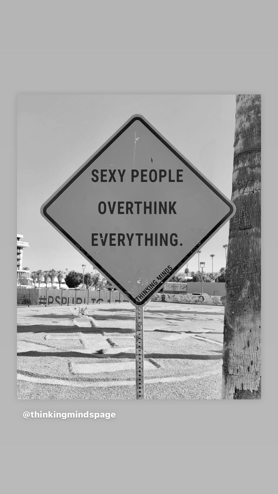 The post featured a black and white photo of a caution sign with text that read: 'Sexy people overthink everything'