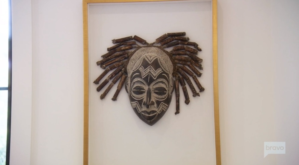 The Wileys have mask sculptures from Gabon hanging around the house