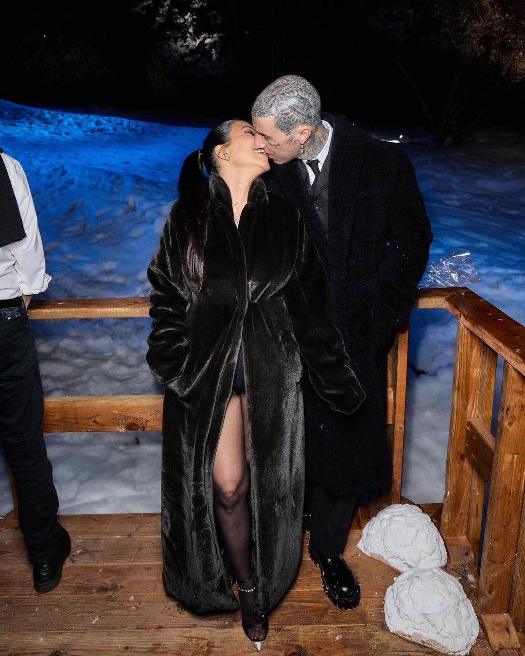 Kourtney and Travis attended Kim Kardashian's Christmas eve party