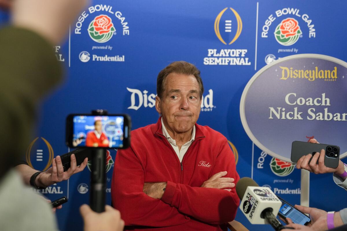 Alabama coach Nick Saban listens to reporters during a welcome event at Disneyland on Wednesday.