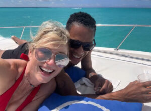 Amy Robach has shown off in a red bikini while lounging with boyfriend TJ Holmes on a yacht