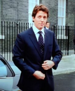Hugh Grant in Love Actually wearing a patterned tie