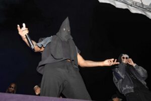 Miami, FL  - *EXCLUSIVE*  - Kanye West, known for his often divisive statements, sparked further controversy by wearing a hood with a striking resemblance to the Klan attire at his 'Vultures' album listening event in Miami, held during Art Basel.
