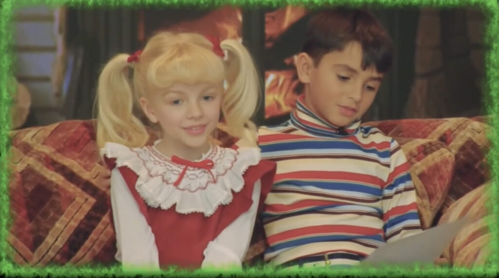 Kelly Ripa and Mark Consuelos had "mini-me's" appear as them for a vintage Christmas segment