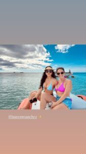 Lauren Sanchez in a bikini rides a boat with her sister Elena Sanchez Blaire during a lavish getaway!