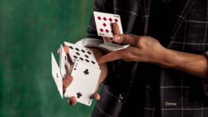 magic card tricks with magician shuffling cards