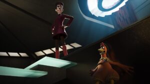 Evil factory-farm owner Mrs. Tweedy stands atop a glass staircase in her a dramatically lit factory headquarters, as chubby chicken Ginger hides in a dark space just below her in Netflix’s Chicken Run: Dawn of the Nugget