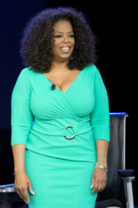 Oprah Winfrey showed off her slender frame at an official event at an art gallery in front of a crowd