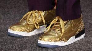 Spike Lee gold Jordan sneakers