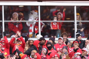 Taylor Swift and Santa are seen in a suite prior to a game between the Las Vegas Raiders and the Kansas City Chiefs