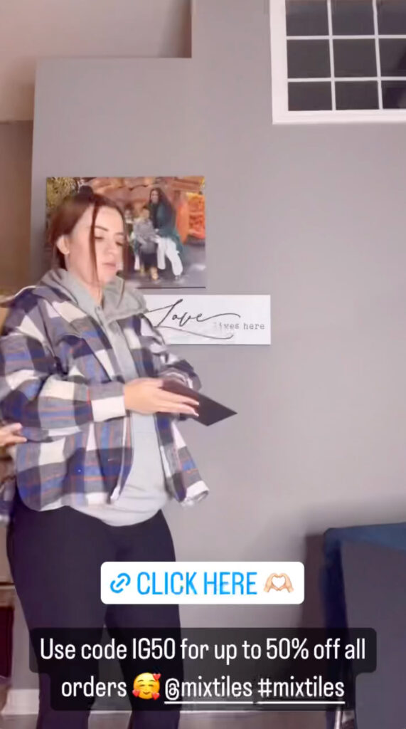 Kayla Sessler wore a loose plaid shirt over her oversized sweatshirt