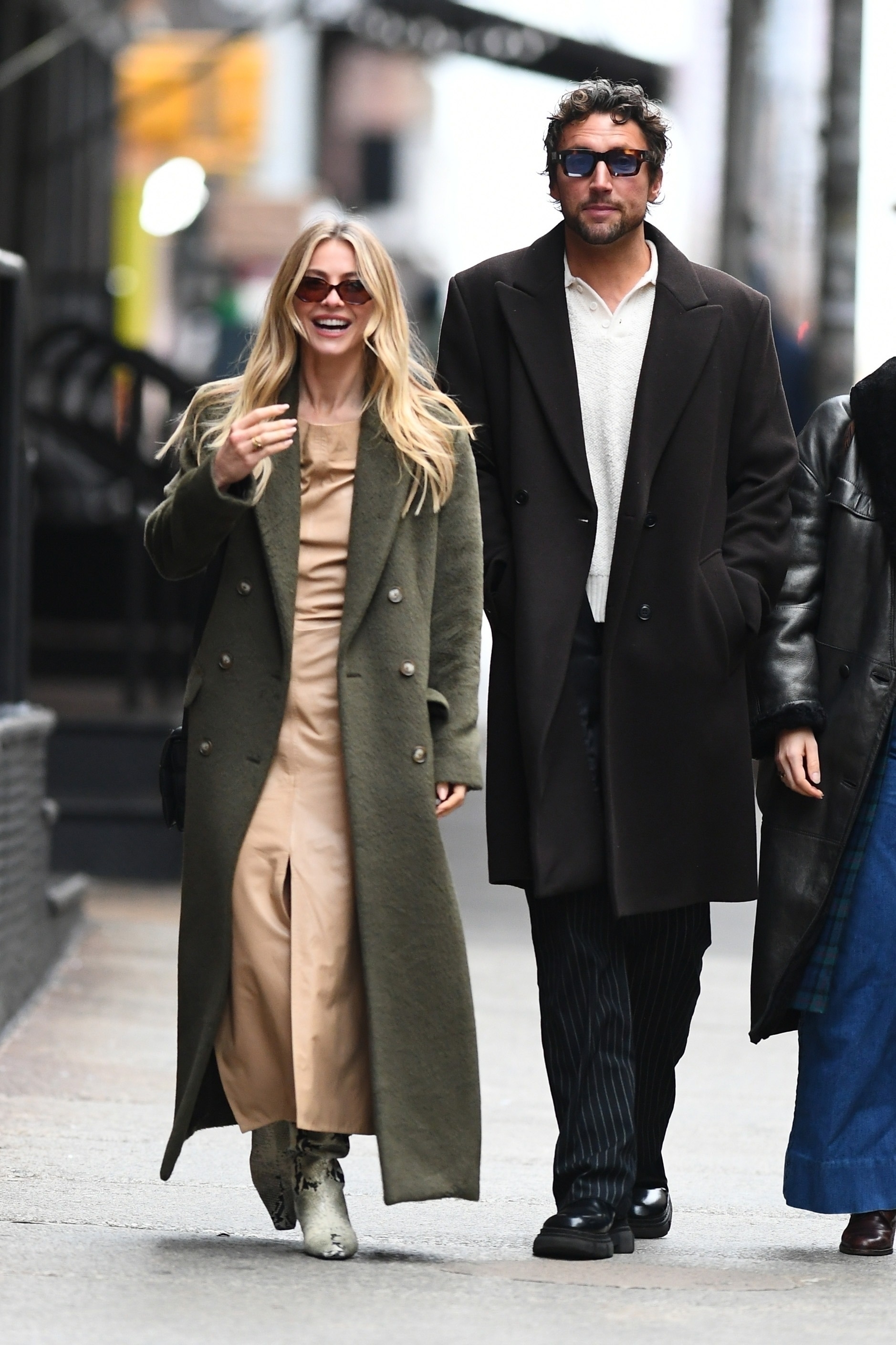 The DWTS host was seen flaunting her winter wardrobe in an olive green overcoat and ankle-length, high-slit tan dress