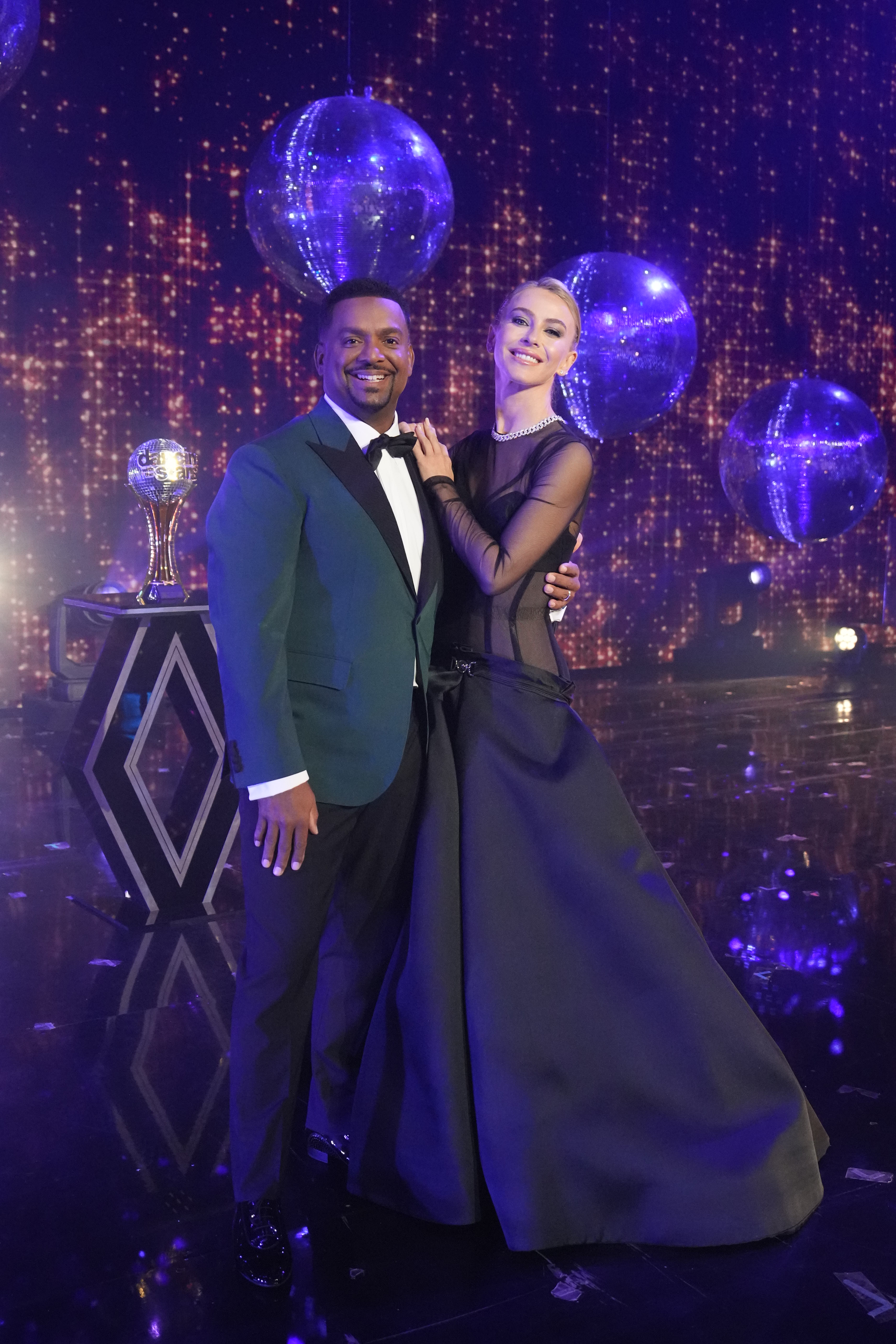 Julianne, pictured here with Dancing with the Stars co-host Alfonso Ribeiro, recently gushed over the Versace dress she wore during the show's season finale