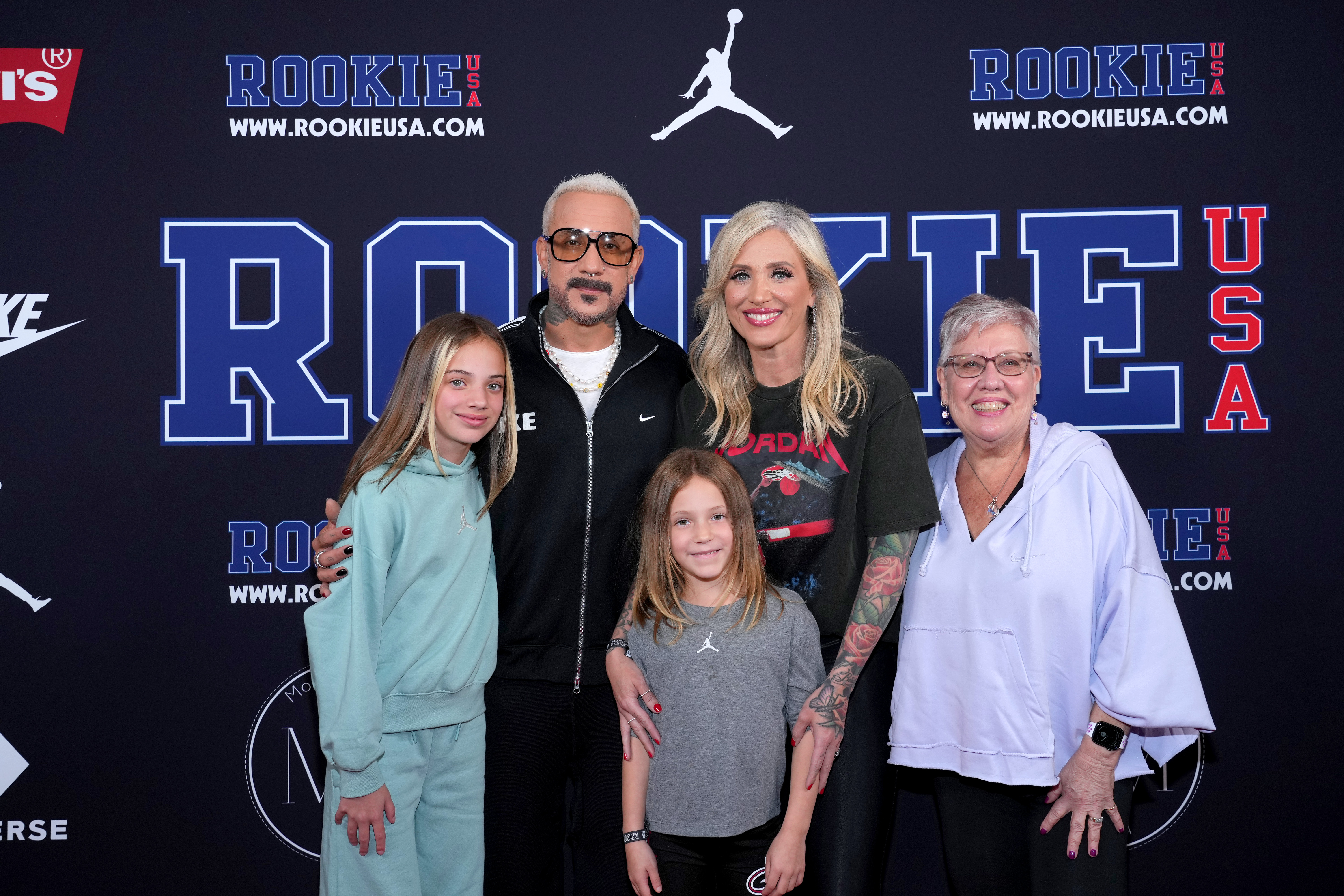 AJ with his wife Rochelle DeAnna McLean their children Elliot and Lyric, and his mom Denise McLean attend the 13th Annual Rookie USA Fashion Show at Iron 23 on September 06, 2023, in New York City