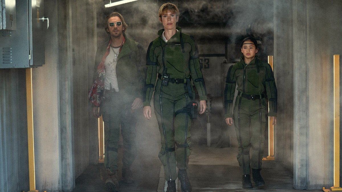 DAN STEVENS as Trapper, REBECCA HALL as Dr. Ilene Andrews and KAYLEE HOTTLE as Jia in Godzilla x Kong