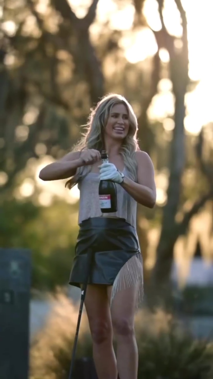 She shared a clip of her opening champagne with her golf club to celebrate New Year's Eve