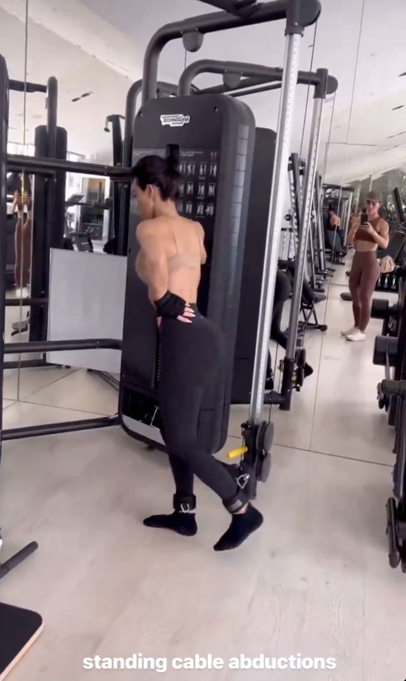 On her Instagram Stories on Friday, Kim shared a video of herself lifting weights with her leg