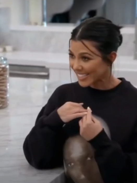 Kourtney was clearly taken with the baby girl, gushing over her smile