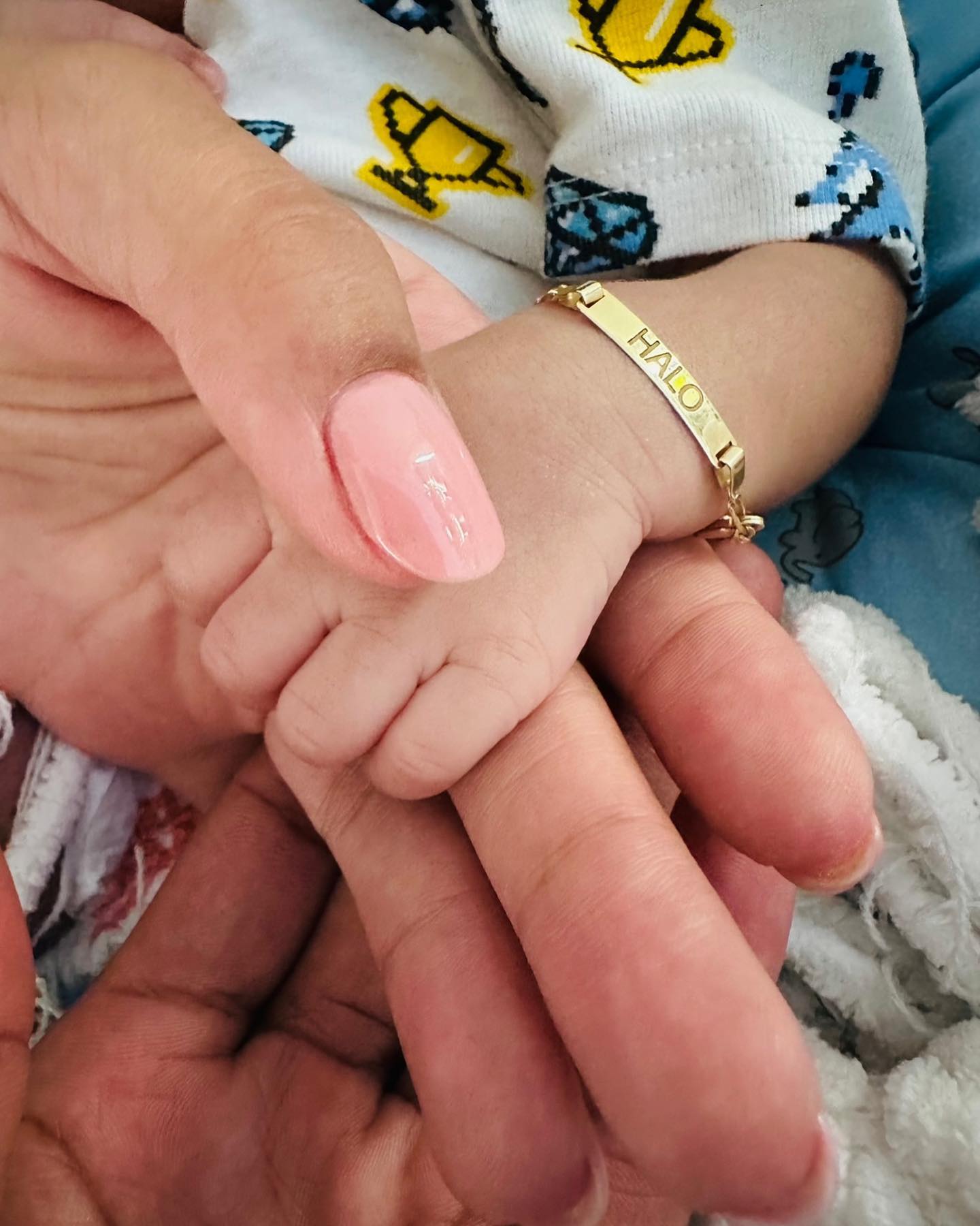 The couple also revealed the baby's first photo