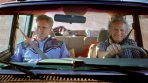 A man and woman drive in a car in the documentary "Will & Harper."