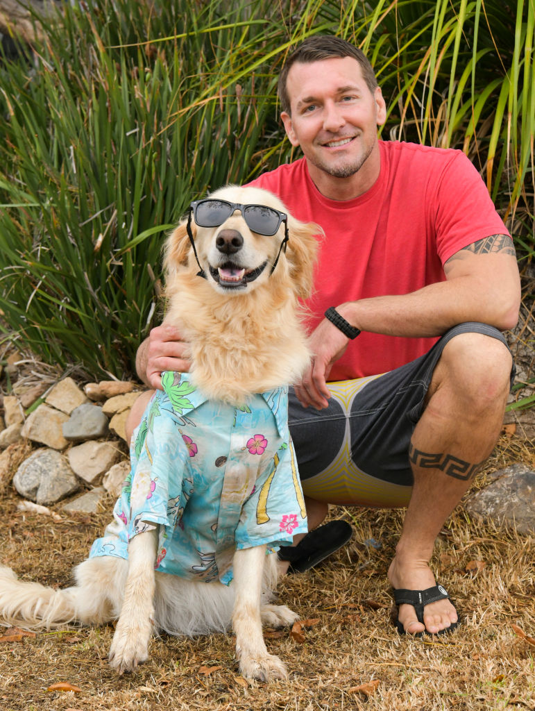 Surfin Jack and Celebrity Dog Trainer Brandon McMillan pose for a portrait while taping a segment for Pawsitive Impact