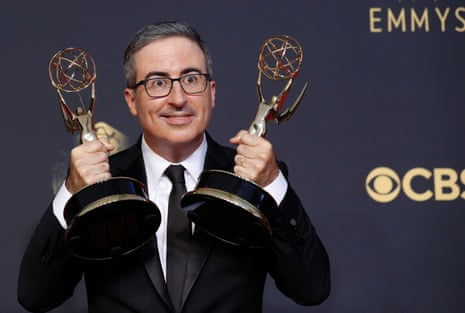 The 73rd Primetime Emmy Awards in Los AngelesComedian John Oliver poses with the awards for outsanding writing for a variety series and outstanding variety talk series, for “Last Week Tonight With John Oliver”, at the 73rd Primetime Emmy Awards in Los Angeles, U.S., September 19, 2021. REUTERS/Mario Anzuoni