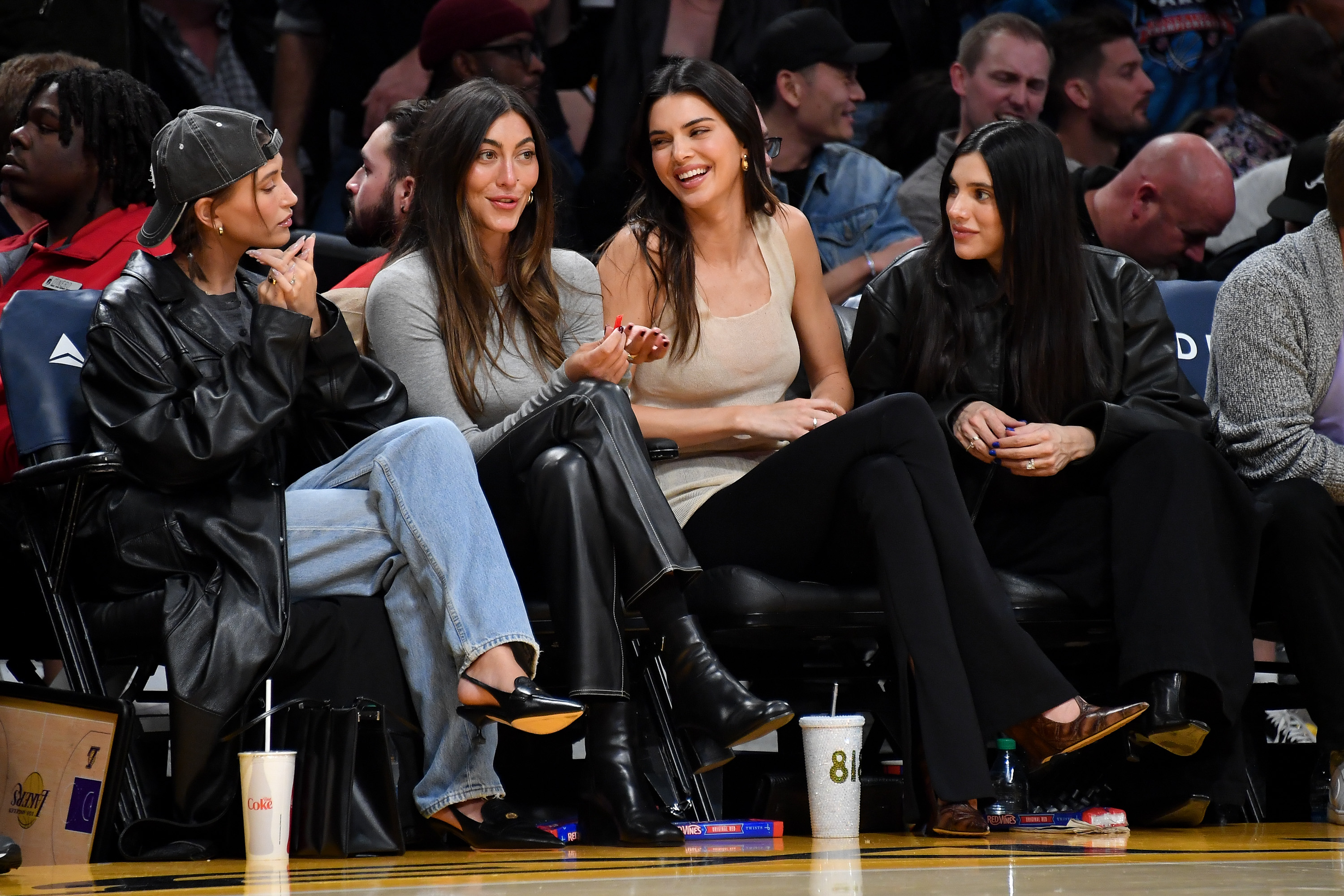 The model listened intently as her friends - including Kendall Jenner - laughed and chatted