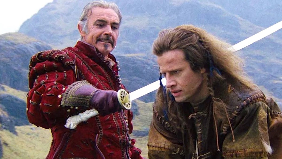 Sean Connery holds a blade to Christopher Lambert's neck in Highlander